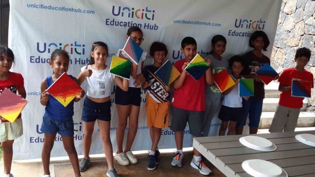 UEH Fun Camp - Children learning how to paint