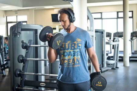 Student lifting dumbbells at Sparc Student lifting dumbbells at Sparc Sport Centre